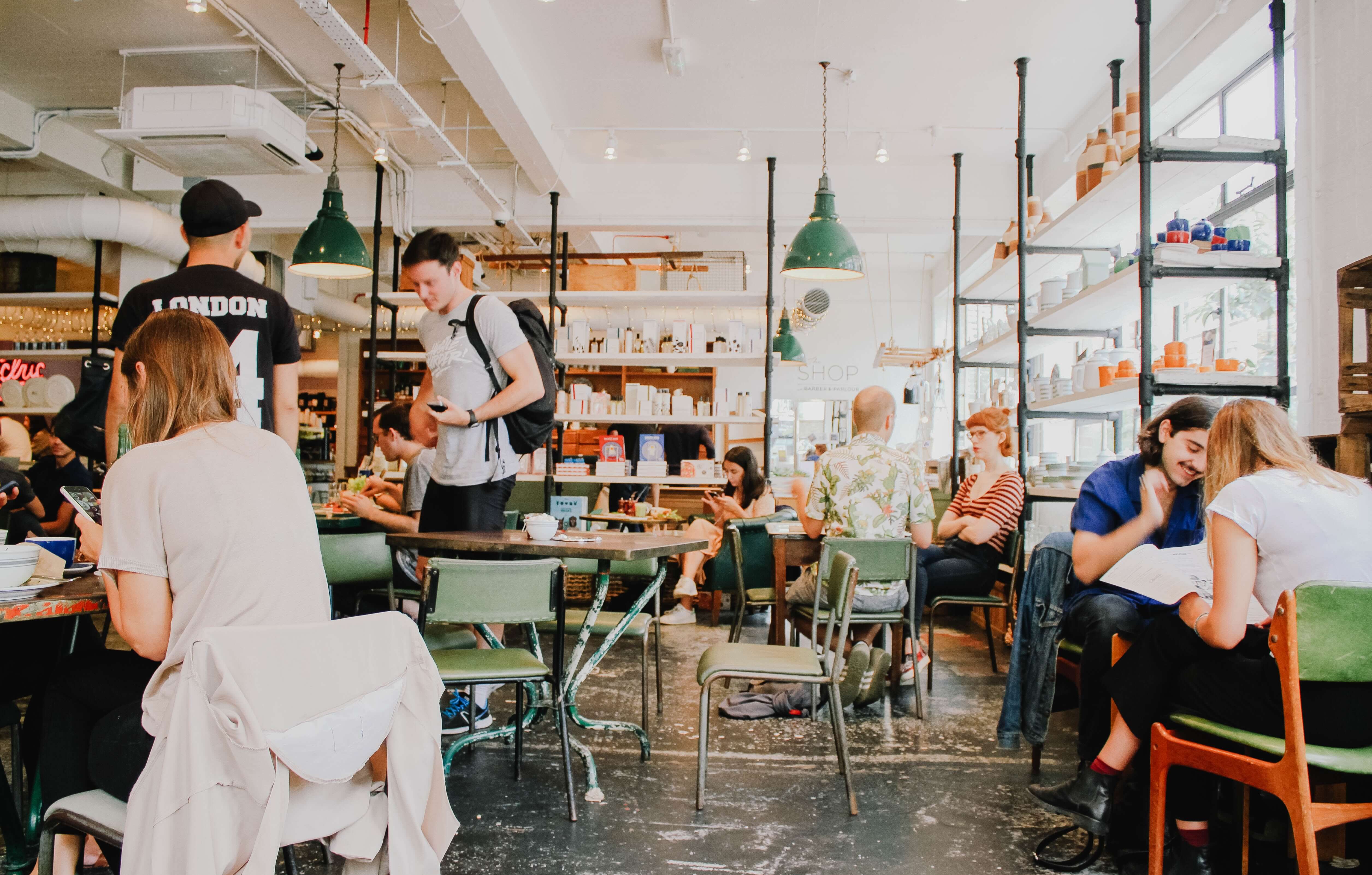 A crowded restaurant, representing one of the top jobs for international students in the USA